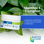 Earth's Care Anti-itch Cream jar with a white lid and white label, styled on green basil leaves. The image includes text overlays reading 'Menthol + Camphor' and 'A powerful combination to help heal and soothe irritated skin' on a blue banner, with the Earth's Care logo at the bottom right.