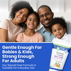 Family of four smiling with Earth's Care Eczema Cream packaging on a blue background