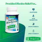 De La Cruz Sodium Bicarbonate USP oral powder antacid bottle on a mint green background with text listing relief benefits for heartburn, acid indigestion, sour stomach, and upset stomach.